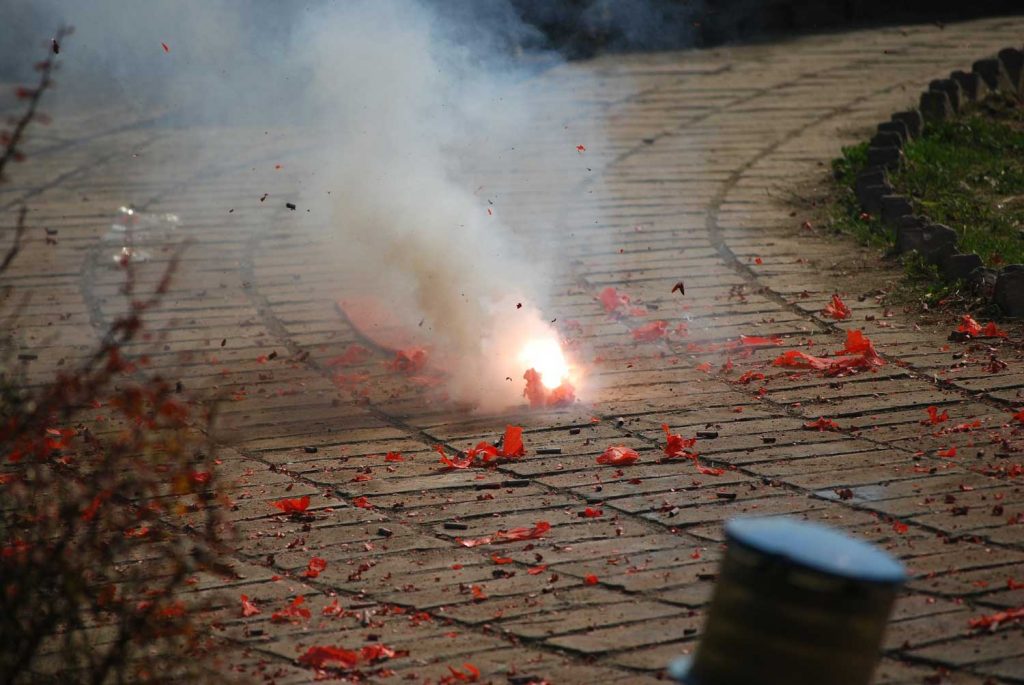 Firecrackers exploding on ground
