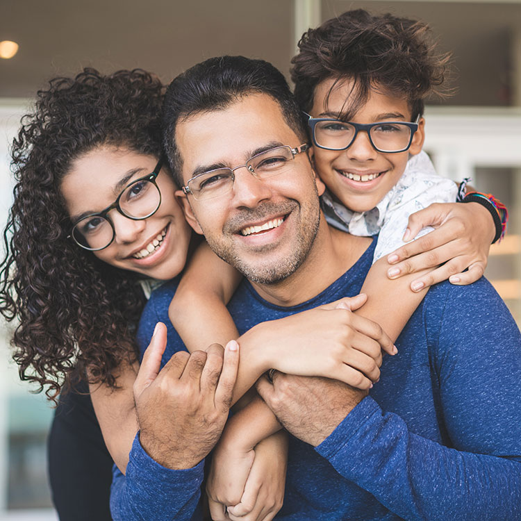 Diverse family of three wearing glasses