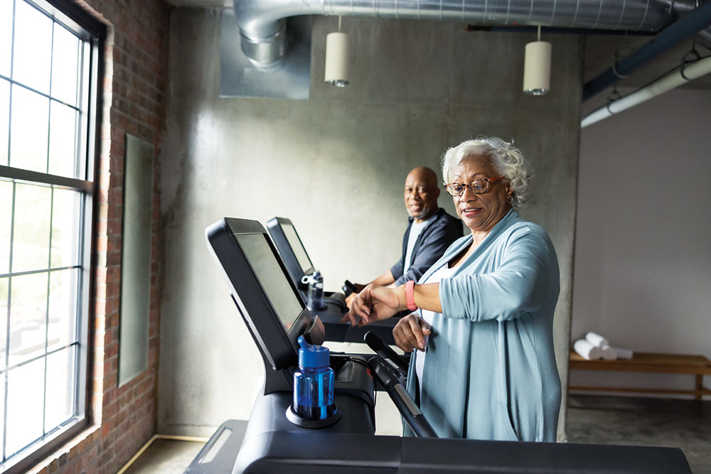 Woman with glasses on treadmill